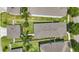 Bird's-eye view of a neatly arranged home featuring a well-manicured lawn and a classic roof design at 10172 Storey Grove Way, Winter Garden, FL 34787
