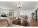 Open floor plan reveals the kitchen, dining area and living room at 10849 William Tell Dr, Orlando, FL 32821