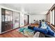 Bright sunroom with sliding doors at 10849 William Tell Dr, Orlando, FL 32821