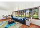 Inviting sunroom with plenty of space for entertaining and relaxing at 10849 William Tell Dr, Orlando, FL 32821
