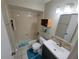 Well-lit bathroom showcasing a bath-shower combo, vanity and tiled backsplash at 1108 Northlake Dr # 1108, Sanford, FL 32773