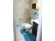 Clean bathroom featuring a shower-tub, toilet, and dark-stained vanity at 1108 Northlake Dr # 1108, Sanford, FL 32773