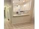 Open-concept kitchen features granite countertops, neutral backsplash, and modern appliances, offering ample prep space at 1108 Northlake Dr # 1108, Sanford, FL 32773
