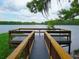 Scenic lake view from a wooden dock, offering tranquil waterfront access and natural beauty at 1108 Northlake Dr # 1108, Sanford, FL 32773