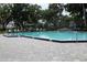 Inviting community pool with ample seating and well-maintained surrounding area at 1108 Northlake Dr # 1108, Sanford, FL 32773