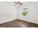 Bedroom with light-colored walls and window that offers a view of the greenery outside at 1119 W 7Th St, Sanford, FL 32771