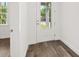 Bright entryway with durable wood flooring and a clear view of the front yard at 1119 W 7Th St, Sanford, FL 32771
