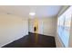 Bedroom with windows, closet and view into ensuite bathroom at 11624 Ocklawaha Dr, Leesburg, FL 34788
