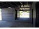 Exterior view of the garage with access to the backyard and main house at 11624 Ocklawaha Dr, Leesburg, FL 34788