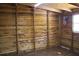 Interior wood walls, window, and wood floor at 11624 Ocklawaha Dr, Leesburg, FL 34788