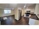 Open-concept view showcasing stainless steel appliances and modern finishes at 11624 Ocklawaha Dr, Leesburg, FL 34788