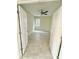 Bright, airy bedroom with ceiling fan and neutral walls at 11982 Travel Aly, Orlando, FL 32832