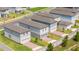 New construction home with garage and brick paver driveway in a modern community at 12259 Bracco St, Winter Garden, FL 34787
