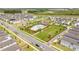 Community recreation area featuring a pool, tennis court, and playground at 12259 Bracco St, Winter Garden, FL 34787