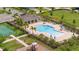 Aerial view of a community pool, playground and sport court at 12259 Bracco St, Winter Garden, FL 34787