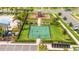 Aerial view of community basketball court, playground and pool at 12259 Bracco St, Winter Garden, FL 34787