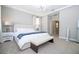 Comfortable bedroom features neutral colors, lots of natural light, and contemporary furnishings at 12259 Bracco St, Winter Garden, FL 34787