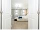 View of the Primary suite from the doorway highlighting modern lighting and decor at 12259 Bracco St, Winter Garden, FL 34787