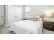 Bedroom with a bed, neutral décor, and double door closet at 12259 Bracco St, Winter Garden, FL 34787