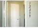 Bright entryway featuring a crisp white door and clear home address numbers at 12259 Bracco St, Winter Garden, FL 34787