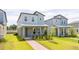 Attractive two-story home with a cozy porch and well-maintained lawn at 12259 Bracco St, Winter Garden, FL 34787