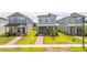 Two-story home with a cozy front porch, sidewalk, and manicured front lawn at 12259 Bracco St, Winter Garden, FL 34787