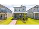 Charming two-story home featuring a welcoming porch and beautiful landscaping at 12259 Bracco St, Winter Garden, FL 34787