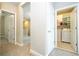 Convenient laundry room featuring modern appliances, ample storage, and bright lighting at 12259 Bracco St, Winter Garden, FL 34787