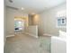 Upstairs loft featuring plush carpet, view into a bedroom, and modern finishes at 12259 Bracco St, Winter Garden, FL 34787