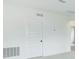 Bright bedroom featuring plush gray carpet, and crisp white walls creating a serene and modern space at 13075 Sunrise Harvest Dr, Winter Garden, FL 34787
