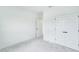 Clean bedroom featuring a closet, doorway, and plush carpeting at 13075 Sunrise Harvest Dr, Winter Garden, FL 34787