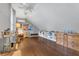 Bright bonus room with hardwood floors, a window, and a large workstation at 1315 E 24Th St, Sanford, FL 32771