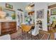 Inviting dining room with hardwood floors, vintage furnishings, and a view into the kitchen at 1315 E 24Th St, Sanford, FL 32771