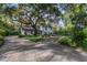 Inviting two-story home with mature landscaping, a spacious driveway, and a welcoming front entrance at 1315 E 24Th St, Sanford, FL 32771