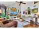 Comfortable living room boasts a decorative rug, modern TV, ample seating, and unique decorations at 1315 E 24Th St, Sanford, FL 32771