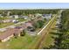 Charming single-Gathering homes with well-maintained lawns, fenced yards, and lush trees in a tranquil neighborhood setting at 1321 Dunbarton Ct, Kissimmee, FL 34758
