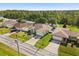 Beautiful aerial view of single-Gathering home featuring nearby trees at 1321 Dunbarton Ct, Kissimmee, FL 34758