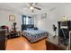 Comfortable bedroom with ceiling fan and plenty of natural light from the window at 1321 Dunbarton Ct, Kissimmee, FL 34758