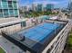 Rooftop basketball court offers residents a unique recreational space with city views at 150 E Robinson St # 2111, Orlando, FL 32801