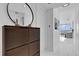 Hallway with stylish storage cabinet and contemporary decor at 150 E Robinson St # 2111, Orlando, FL 32801