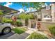 Charming townhome exterior featuring manicured landscaping, stucco walls, and a convenient carport at 1525 Farrindon Cir, Lake Mary, FL 32746