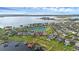 Aerial view of a waterfront property with private dock at 16086 Johns Lake Overlook Dr, Winter Garden, FL 34787