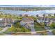 Aerial view of a beautiful home that has a waterfront view at 16086 Johns Lake Overlook Dr, Winter Garden, FL 34787