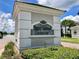 Elegant community entrance sign: Hickory Hammock at Johns Lake, complemented by lush landscaping at 16086 Johns Lake Overlook Dr, Winter Garden, FL 34787