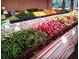 Abundant farmers market display overflowing with fresh, colorful produce, offering a delightful array of seasonal delights at 16086 Johns Lake Overlook Dr, Winter Garden, FL 34787