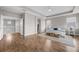 Bright main bedroom features hardwood floors, tray ceilings and natural light at 16086 Johns Lake Overlook Dr, Winter Garden, FL 34787