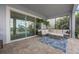 Relaxing screened-in patio with comfortable seating and outdoor views at 16086 Johns Lake Overlook Dr, Winter Garden, FL 34787