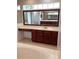 Bathroom with dual vanity, large mirror, and tiled floor; featuring separate shower at 2143 Autumn View Dr, Orlando, FL 32825