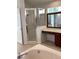 Bathroom area showcases a soaking tub, walk-in shower, and vanity; naturally lit from above at 2143 Autumn View Dr, Orlando, FL 32825