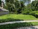 Lush front lawn provides a large green space at the front of the property at 2143 Autumn View Dr, Orlando, FL 32825